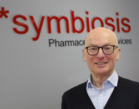 Headshot of David Collins, member of the Symbiosis Leadership team with Symbiosis background